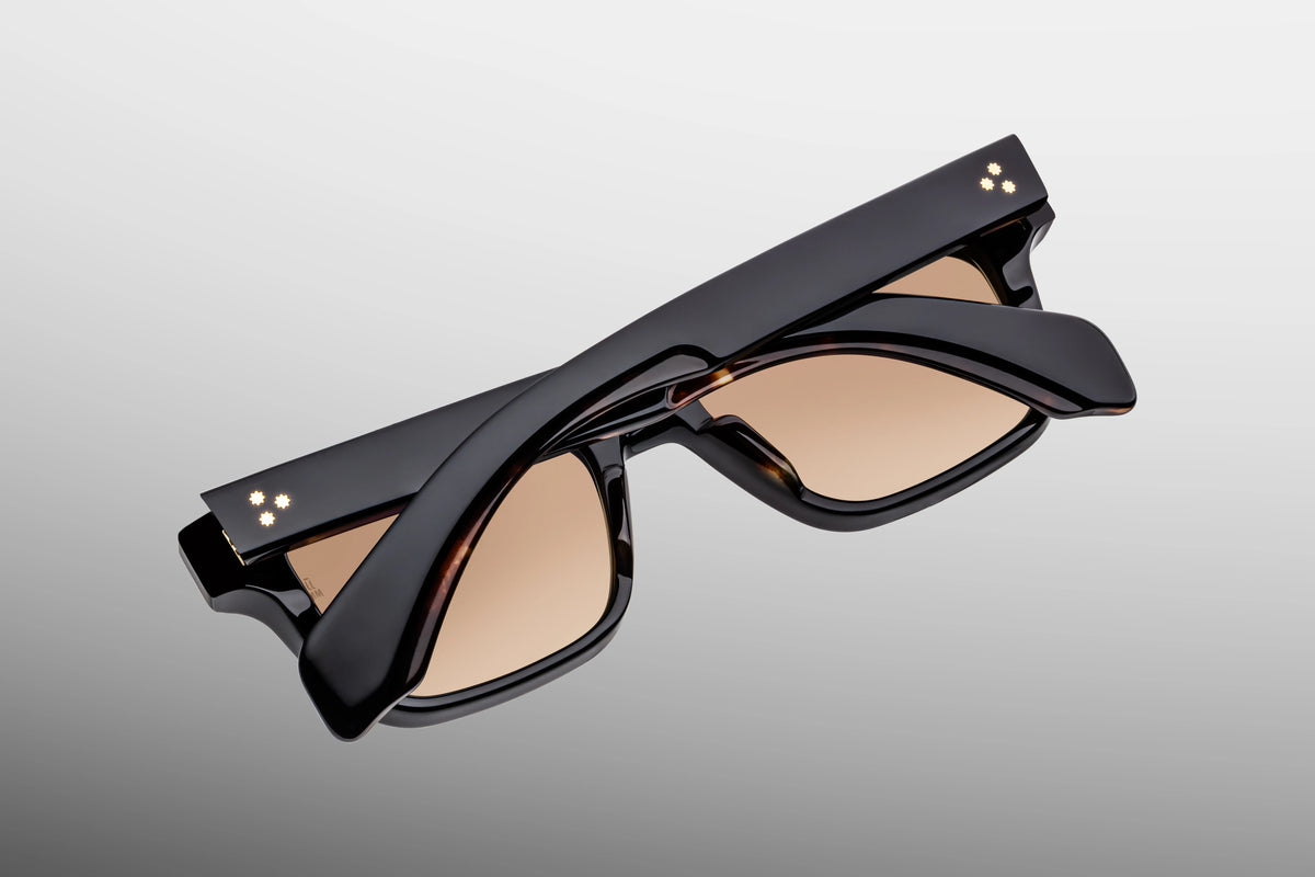 Inner rear view of Jacques Marie Mage Molino Noir 15 sunglasses, showcasing the robust, custom 7-barrel hinge with spur-shaped rivets and the limited-production batch number foil-stamped in silver on the interior arm.
