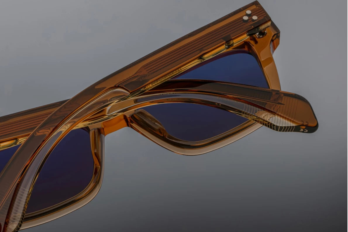 Rear view of the JMM Molino 51 Whiskey temples, detailing the curved inner translucent amber acetate tips and the clear visibility of the internal sterling silver wirecore core running to the ends.