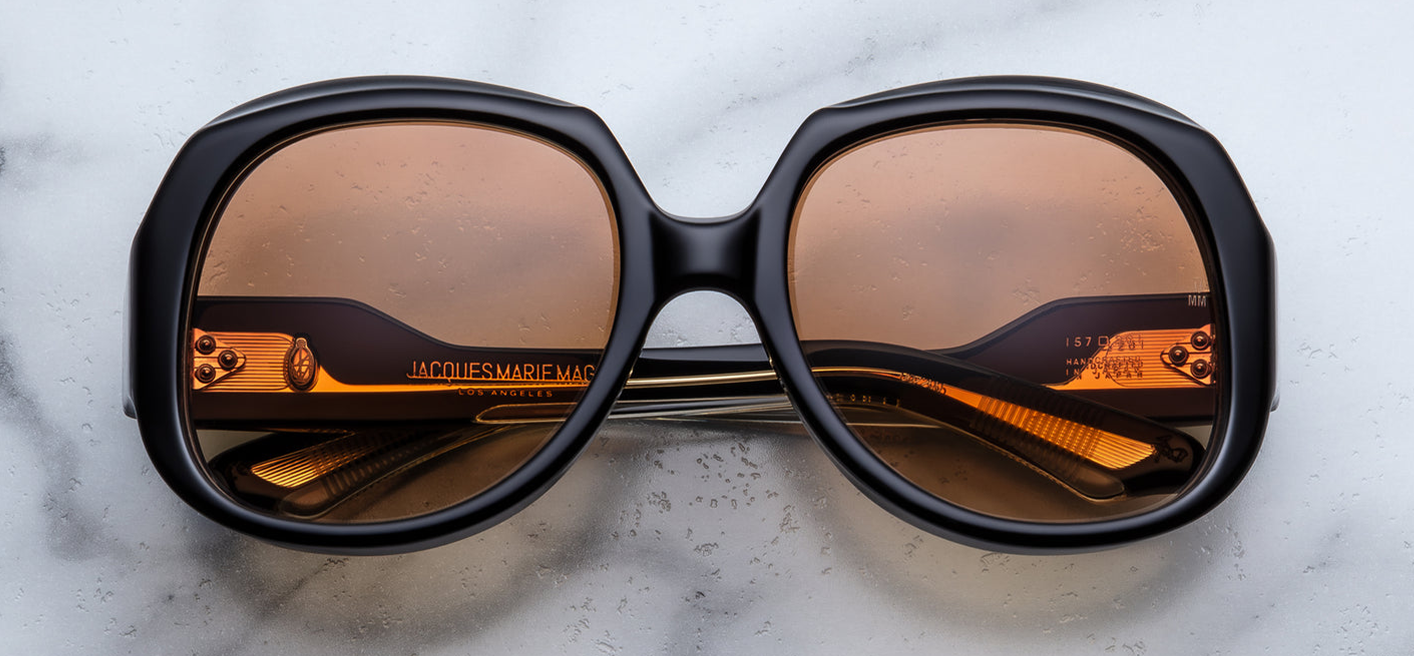 Jacques Marie Mage Ocean Child Beluga — oversized late‑’70s rounded‑square frame in deep midnight (beluga) acetate with warm gradient bronze lenses