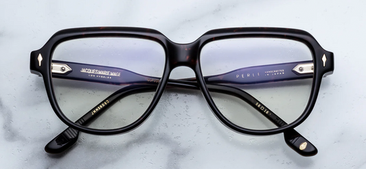 Jacques Marie Mage Perle Agar optical frame front view, flat brow round eyeglasses in dark brown havana acetate with silver arrowhead rivets
Front view of JMM Perle Agar glasses, sculptural round lenses with bold flat brow in rich brown acetate