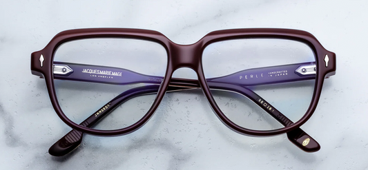 Jacques Marie Mage Perle Bordeaux optical frame front view, flat brow round eyeglasses in deep red acetate with silver arrowhead rivets
Front view of JMM Perle Bordeaux glasses, sculptural round lenses with bold flat brow in rich burgundy acetate