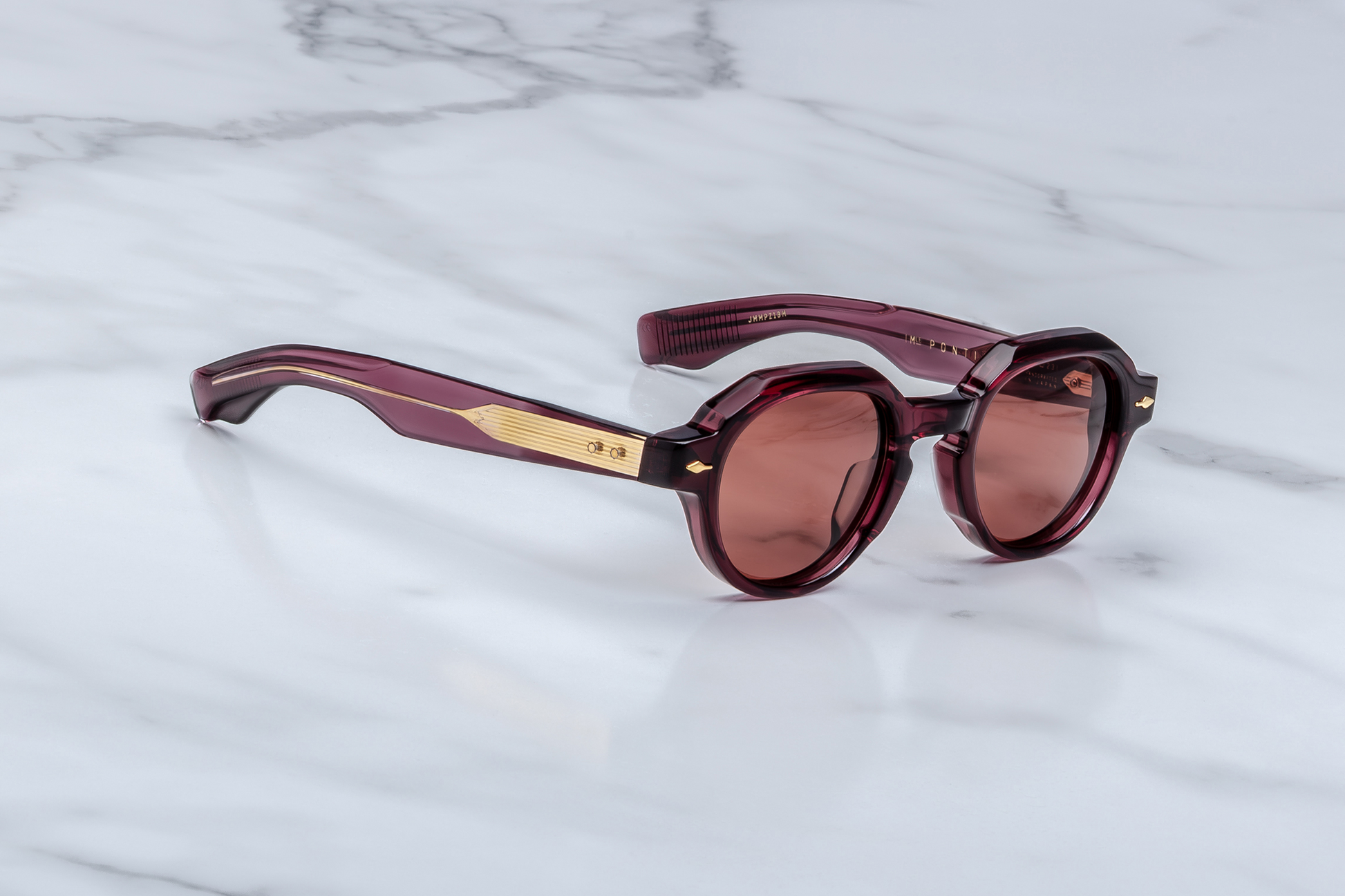 Side profile of Pontian Amarena — burgundy double-laminated temple with exposed silver ‘Classic’ wire-core