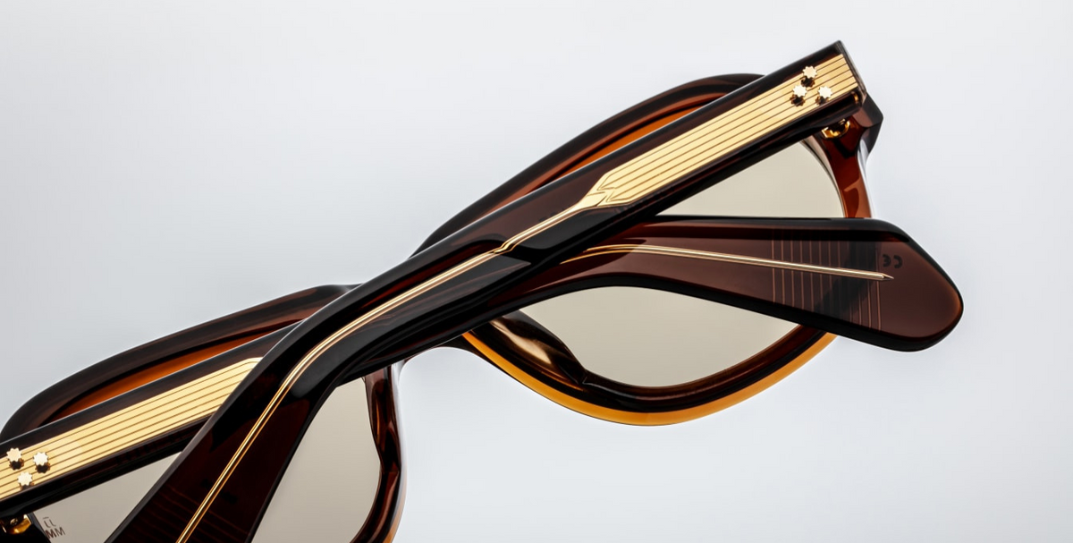 Back view of Jacques Marie Mage Richard sunglasses in Teak, showcasing the rich brown-toned acetate frame with sculpted brow and cheek contours. The dark gold arrowhead front pins and exposed wirecore details are prominently displayed, reflecting the frame's artisanal craftsmanship