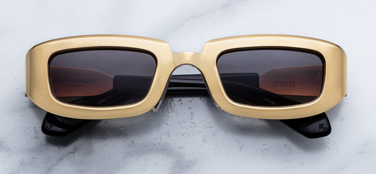 Jacques Marie Mage Ryder sunglasses in Gold front view – luxury aviator style frame with gold titanium construction and tinted lenses – available at Wink Optometrists