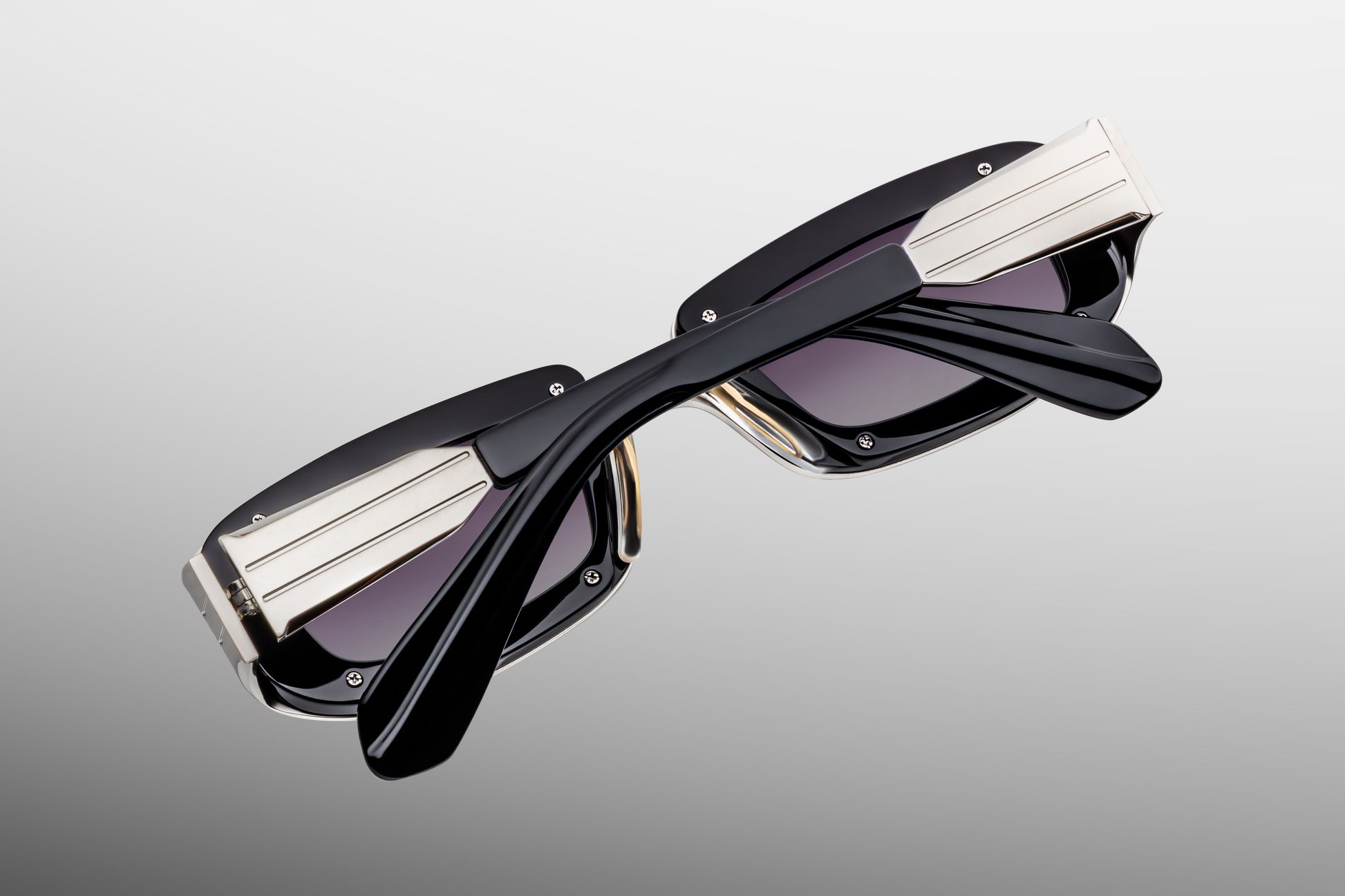 Close up back detail of Jacques Marie Mage Ryder Silver sunglasses highlighting precision titanium frame craftsmanship and hinge construction – available at Wink Optometrists