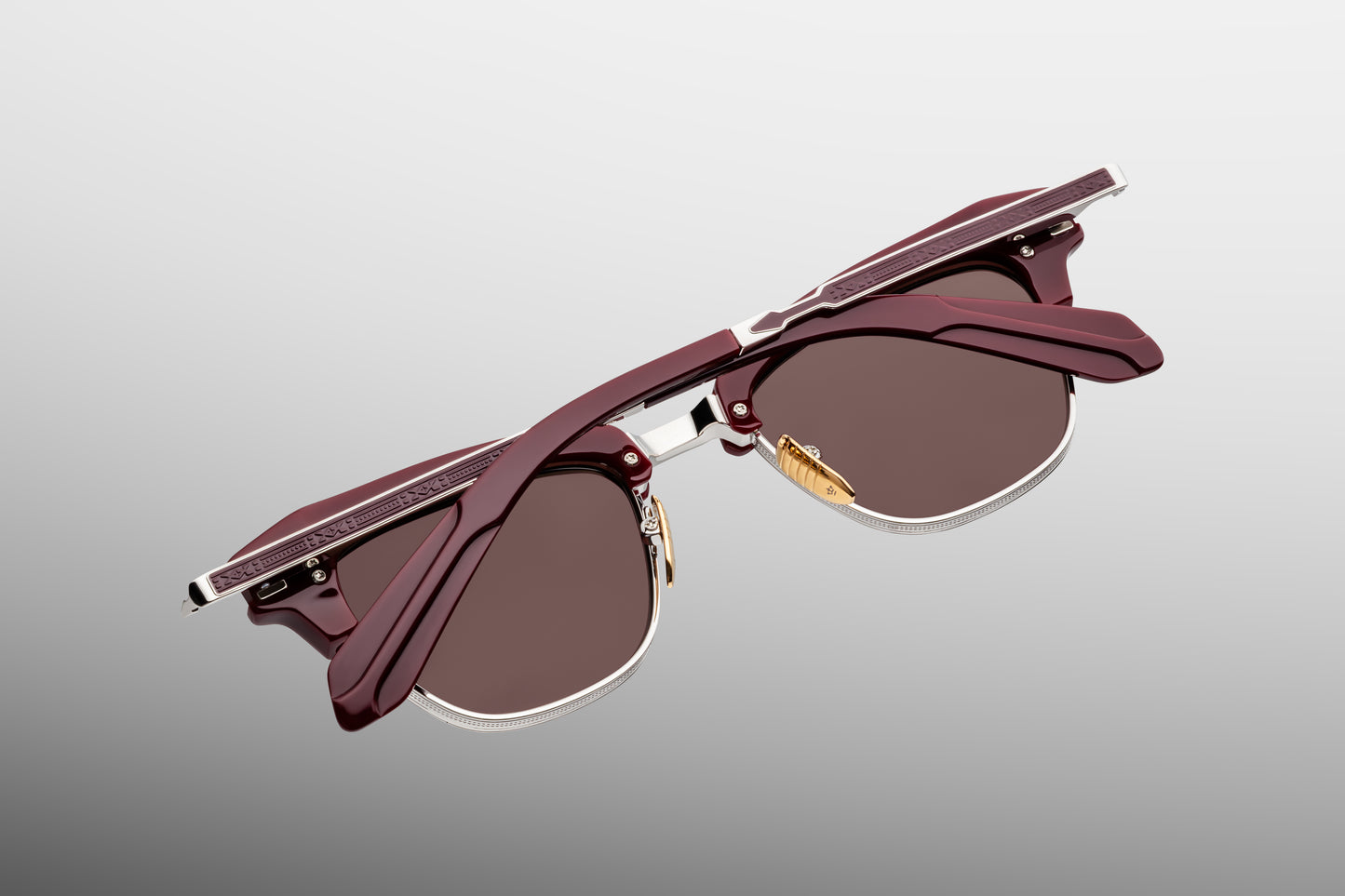 Jacques Marie Mage Sartre Bordeaux sunglasses bottom view showing round titanium rims, adjustable nose pads, and detailed bridge craftsmanship