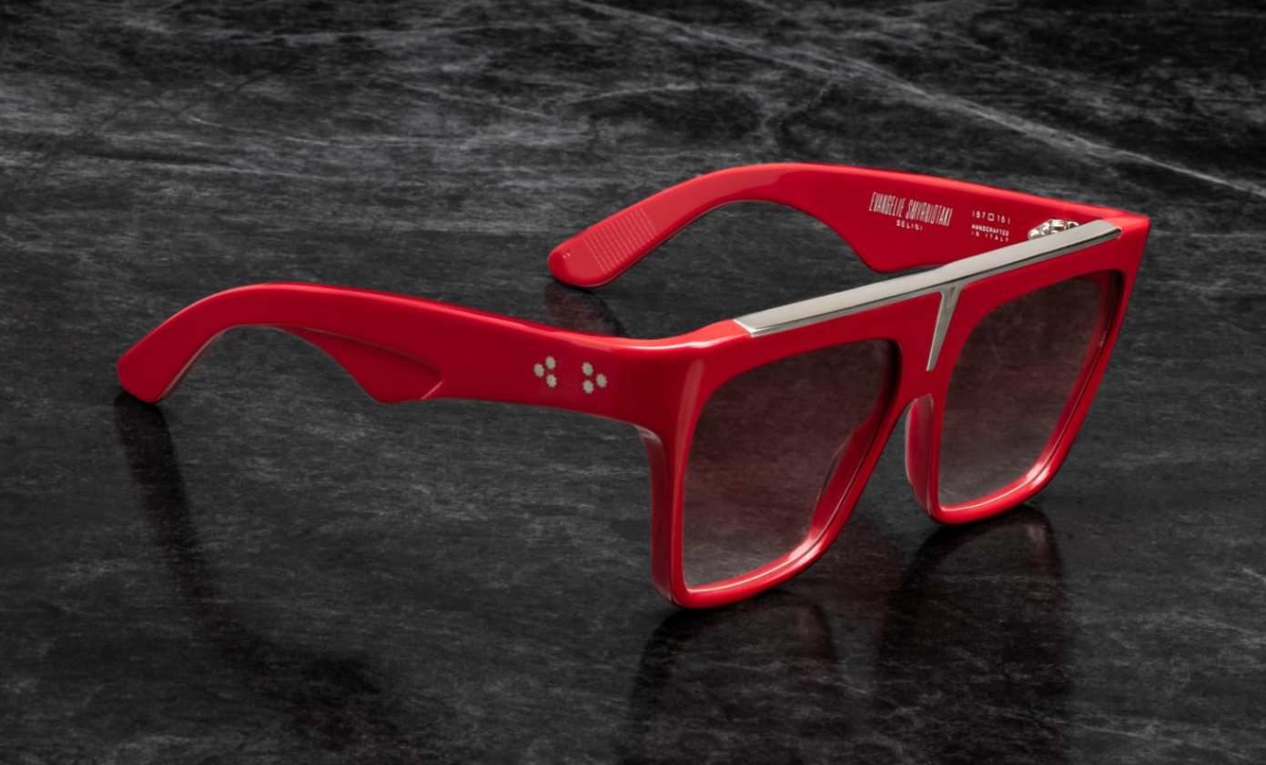 Side profile of Selini Ruby — glossy red acetate temple with hidden silver wire-core and sleek silhouette.