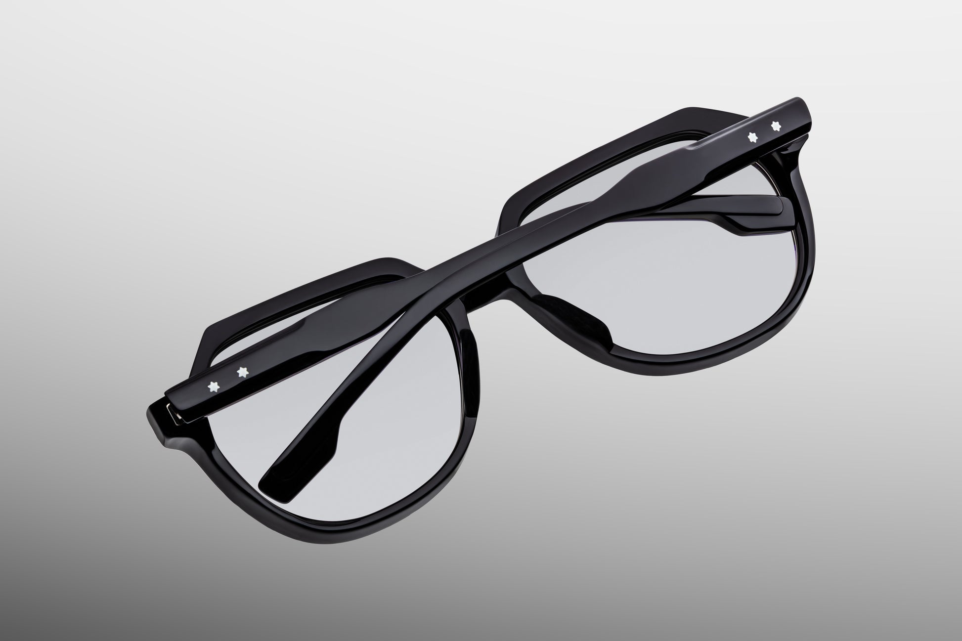 Close-up back view of Jacques Marie Mage Shozo black optical frame showing inner temple engraving and exposed wire core
Rear detail of JMM Shozo black eyeglasses revealing handcrafted acetate interior and limited edition markings