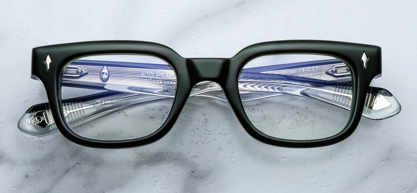 Jacques Marie Mage Stewart Borneo optical frame front view, rectangular mid-century eyeglasses in green acetate with sculpted silhouette
Front view of JMM Stewart Borneo glasses, boxy rectangular frame in deep green acetate with signature arrowhead rivets
