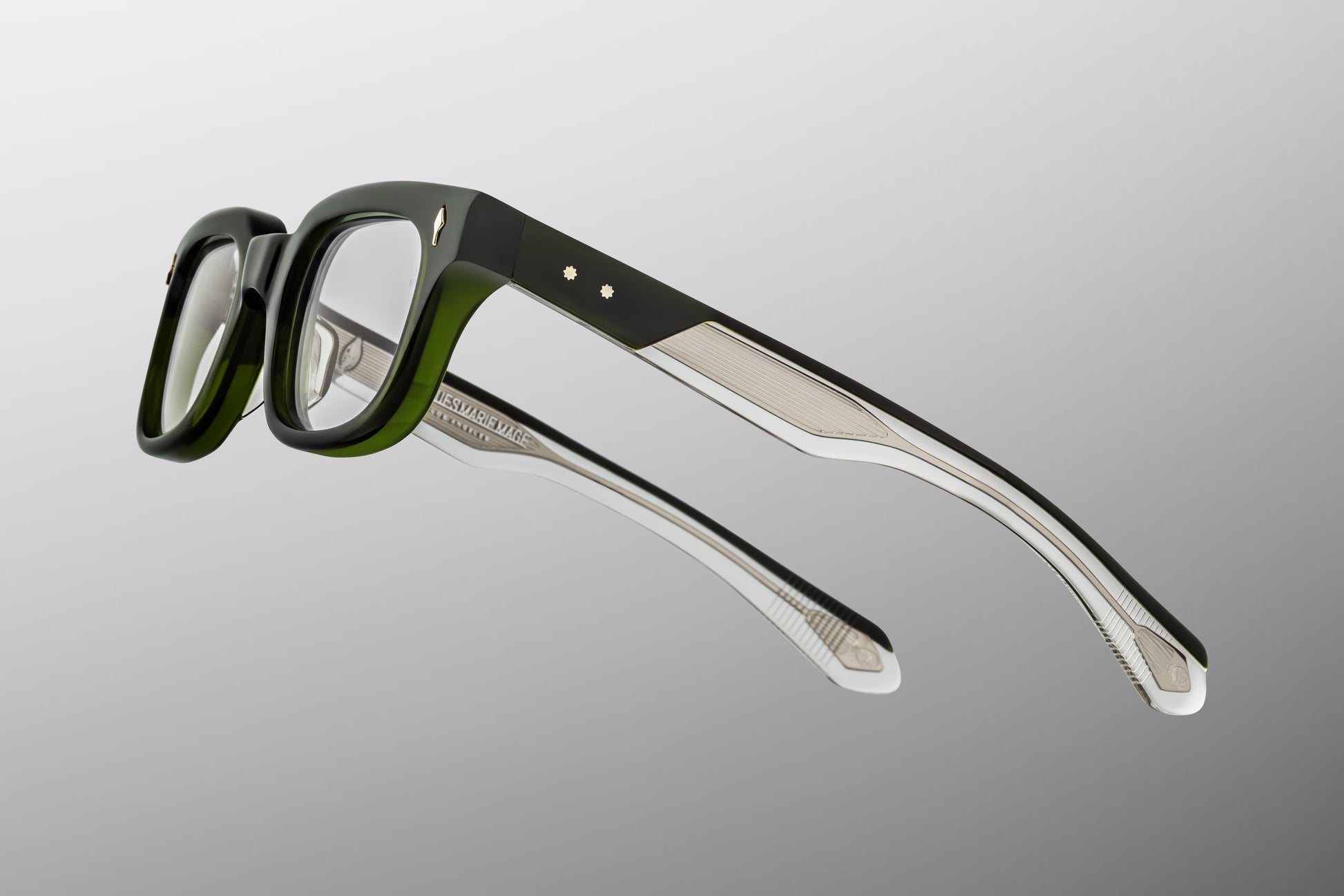 Close-up back view of Jacques Marie Mage Stewart Borneo optical frame showing inner temple engraving and exposed wirecore structure
Rear detail of JMM Stewart Borneo glasses revealing handcrafted acetate interior and limited edition markings