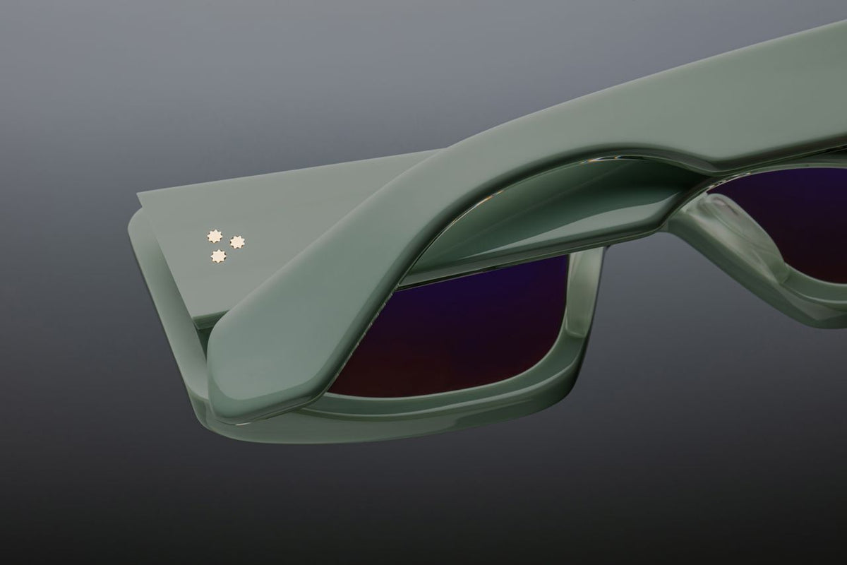 Rear view of JMM Supersonic Glacier sunglasses showing 9-barrel hinges from WINK Optometrists collection.