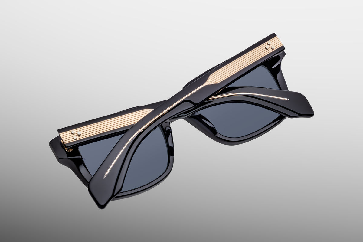 Inner rear view of Jacques Marie Mage Torino Lacquer sunglasses, detailing the heavy-duty 7-barrel hinge with spur-shaped rivets and the limited-production batch number foil-stamped in gold on the interior temple arm.
