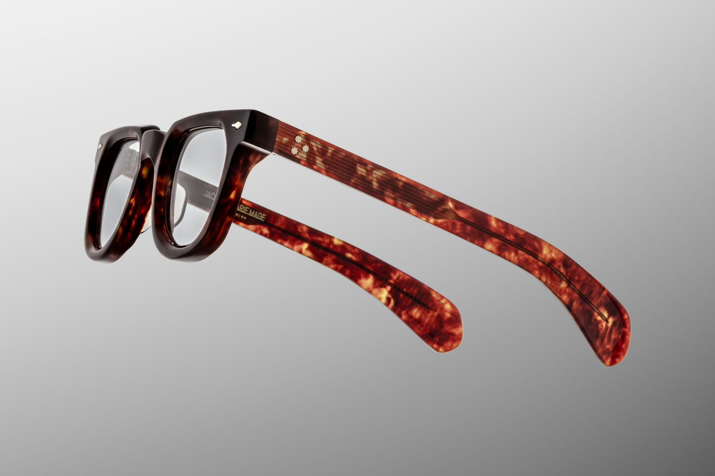 Close-up of the Vendome Breccia hinge — light-gold 7-barrel custom hinge with tension-secured assembly and engraved details