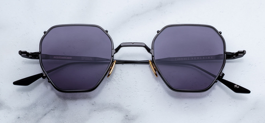 Jacques Marie Mage Verlaine sunglasses in Corbeau front view – bold black acetate square frame with signature arrowhead rivets and dark lenses – available at Wink Optometrists
