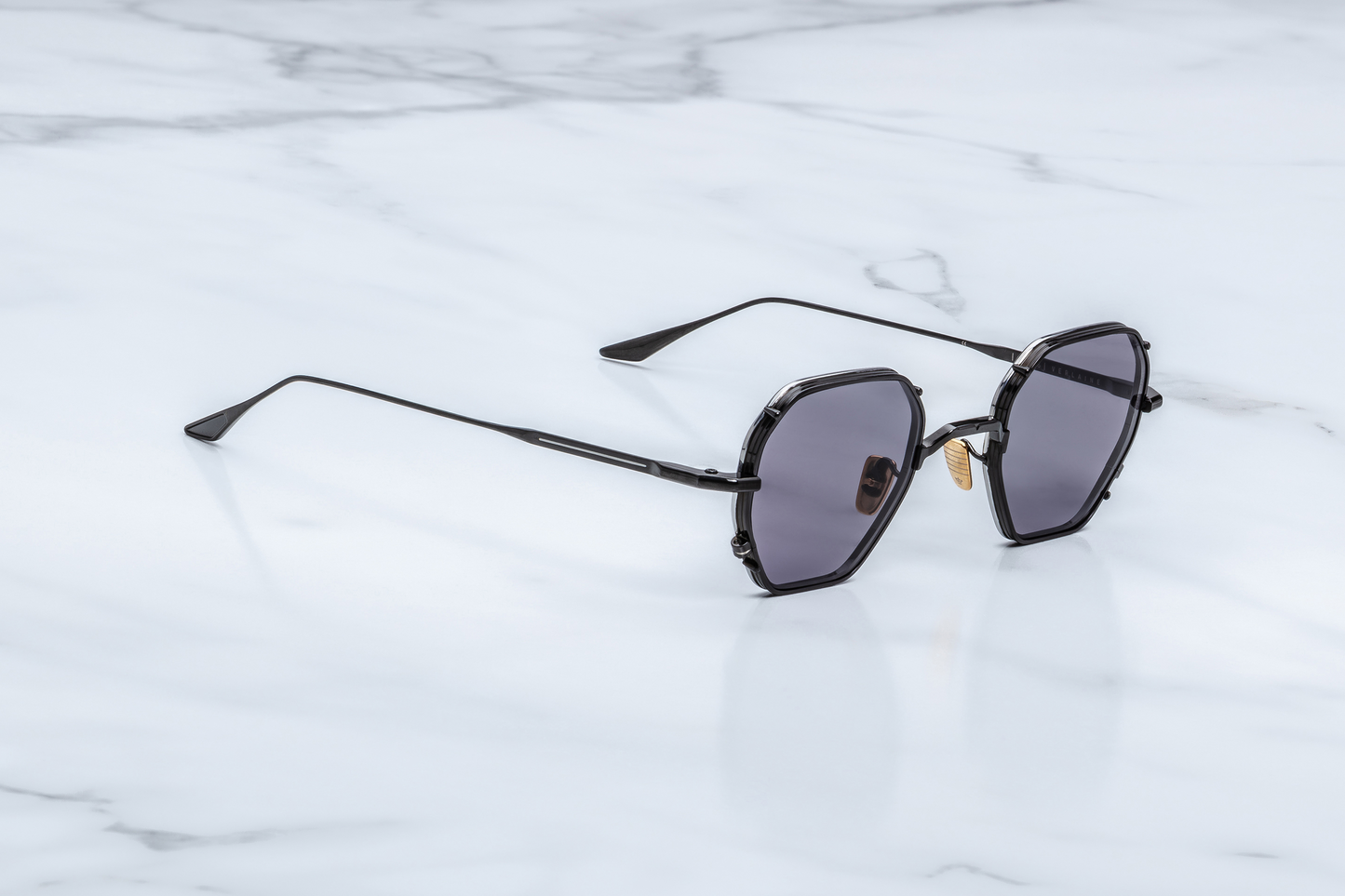Jacques Marie Mage Verlaine Corbeau sunglasses three quarter angle showing sculpted black acetate frame, thick temples and luxury craftsmanship – available at Wink Optometrists