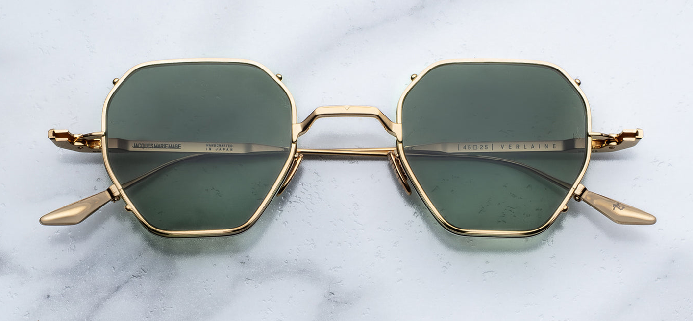 Jacques Marie Mage Verlaine sunglasses in Muskett front view – bold square translucent brown acetate frame with dark lenses and signature arrowhead rivets – available at Wink Optometrists