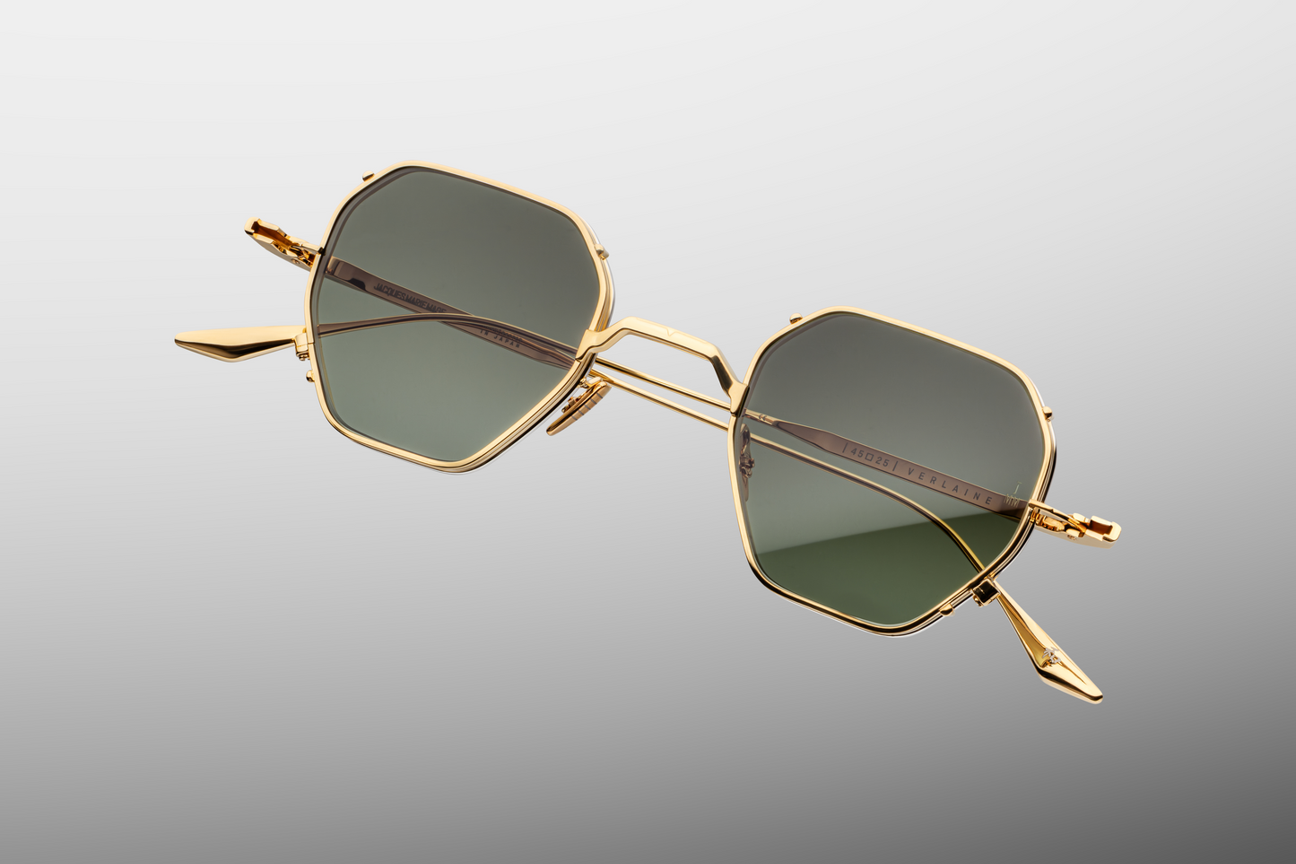 Close up front detail of Jacques Marie Mage Verlaine sunglasses in Muskett showing signature arrowhead rivets, sculpted acetate frame and dark lenses – available at Wink Optometrists