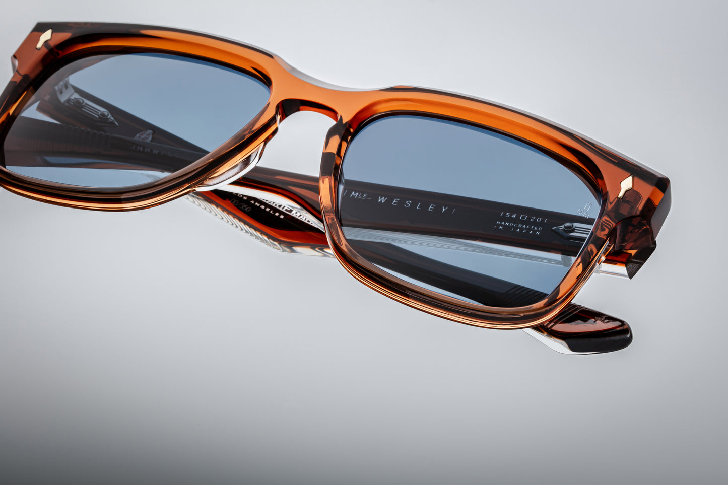 Top-down of Wesley Rootbeer — wide 20 mm keyhole bridge, clean browline, and smooth bevelled brown acetate frame.