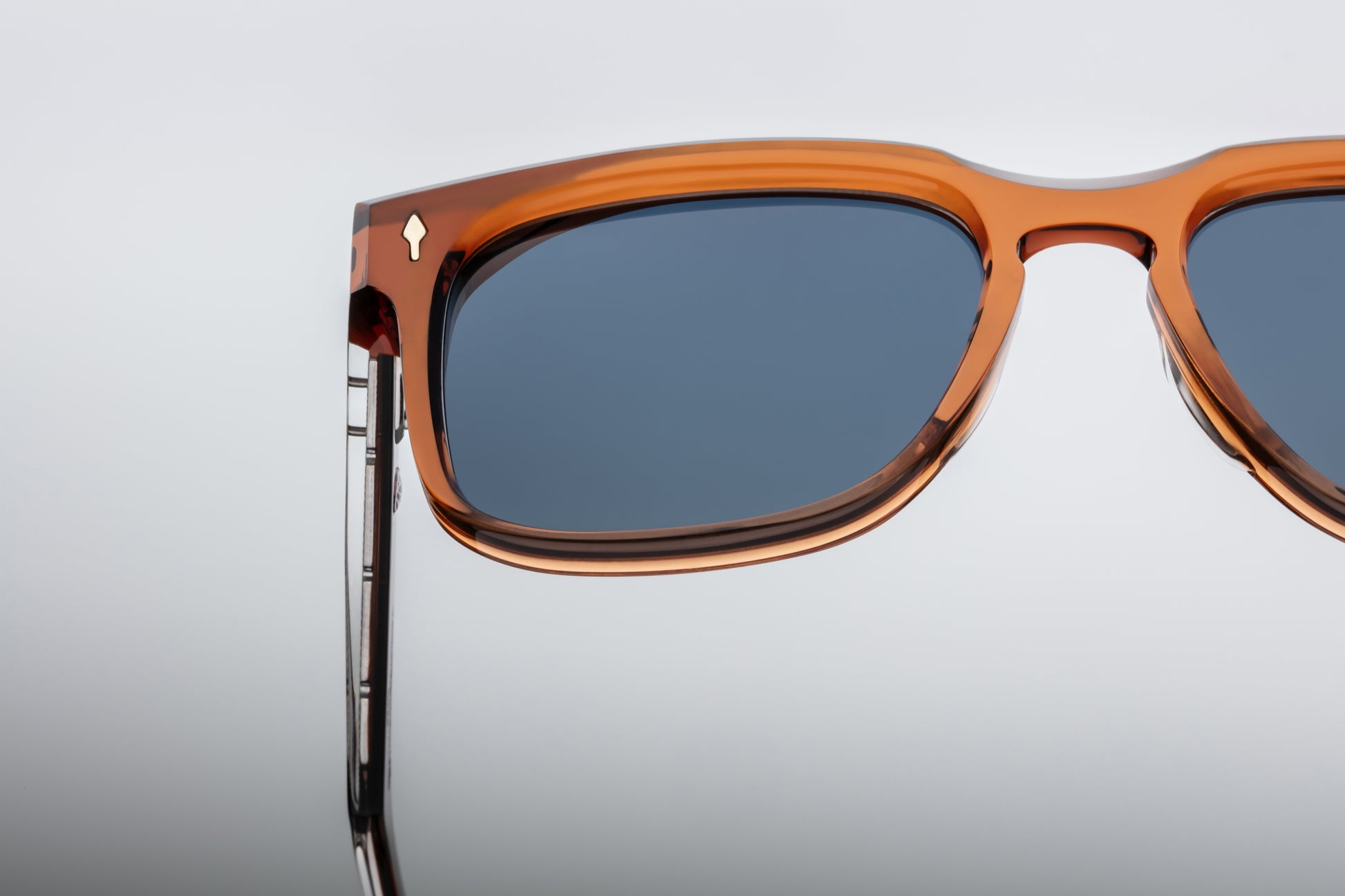 Top-down of Wesley Rootbeer — wide 20 mm keyhole bridge, clean browline, and smooth bevelled brown acetate frame.
