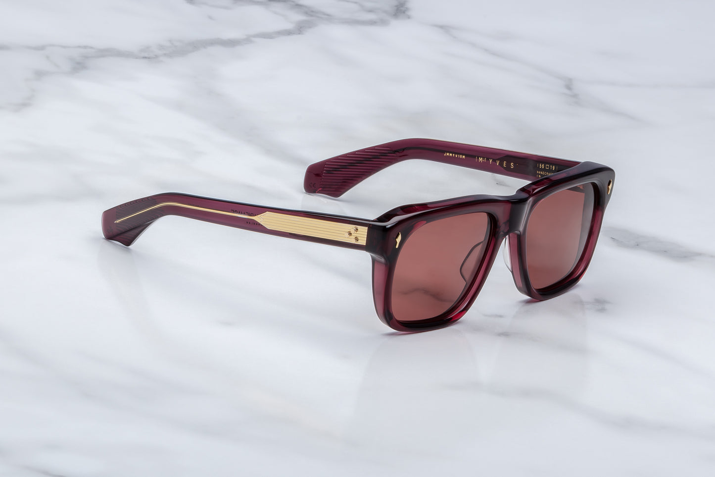 Side profile of Yves Amerena eyeglasses, showing slim temple arm design, hinge detailing, and subtle branding along the side. 