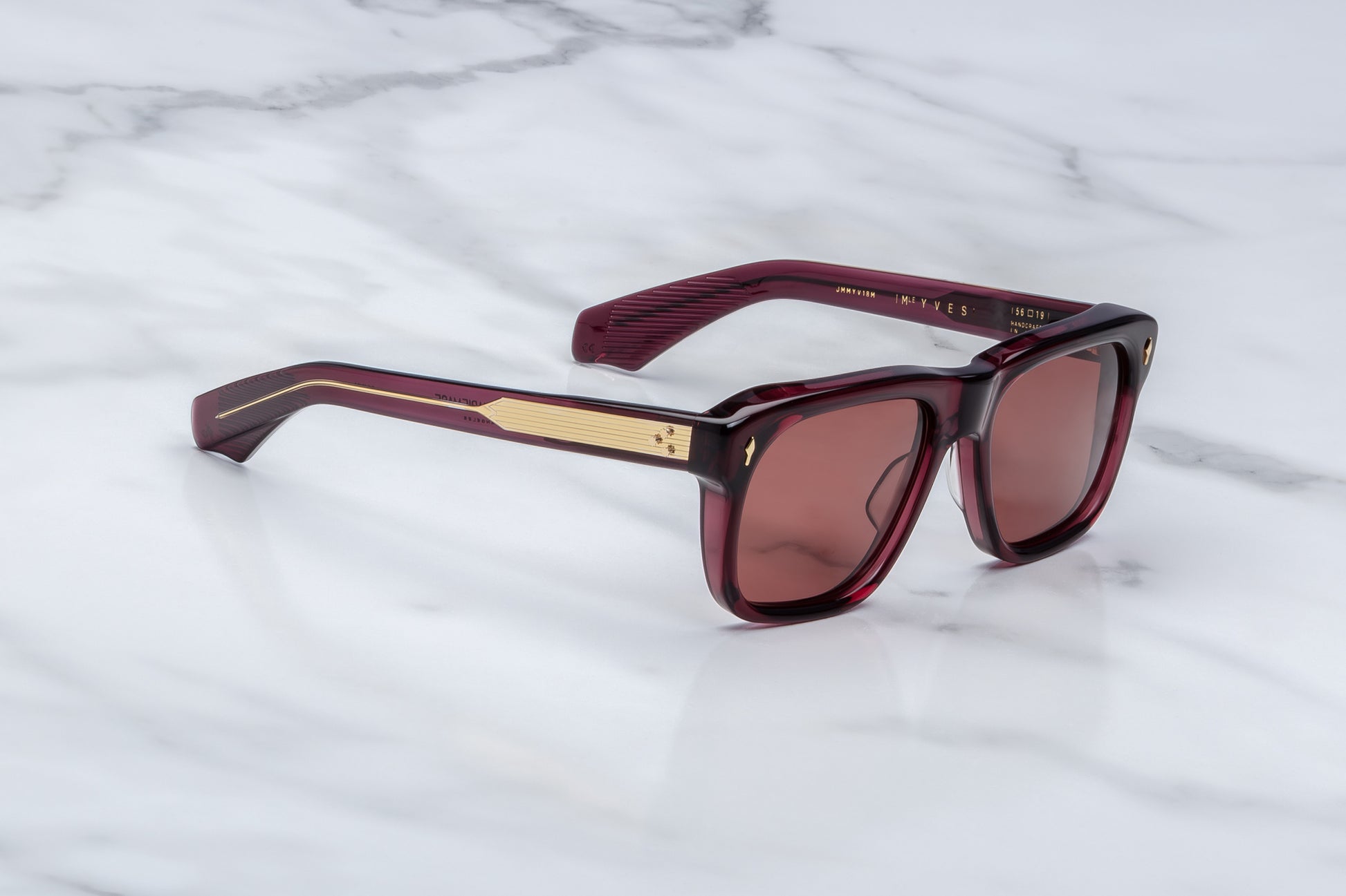 Side profile of Yves Amerena eyeglasses, showing slim temple arm design, hinge detailing, and subtle branding along the side. 