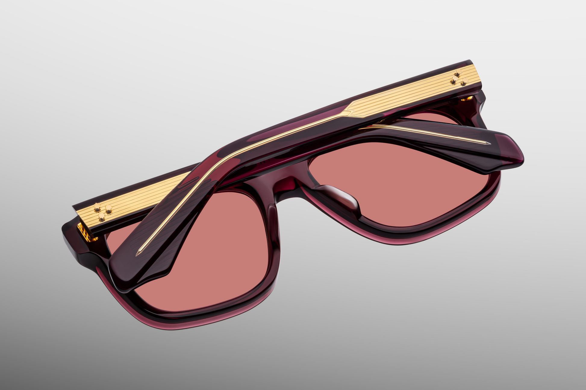 Close-up of Yves Amarena lenses — Ammarena CR39, 4-base lens with backside anti-reflective coating, set in red frame