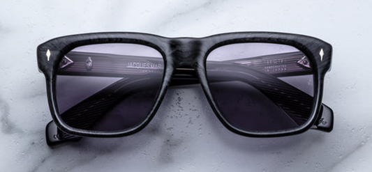 Front of JMM Yves Ebony sunglasses — wide rectangular charcoal burlwood frame with sterling-silver arrowhead pins at the hinges