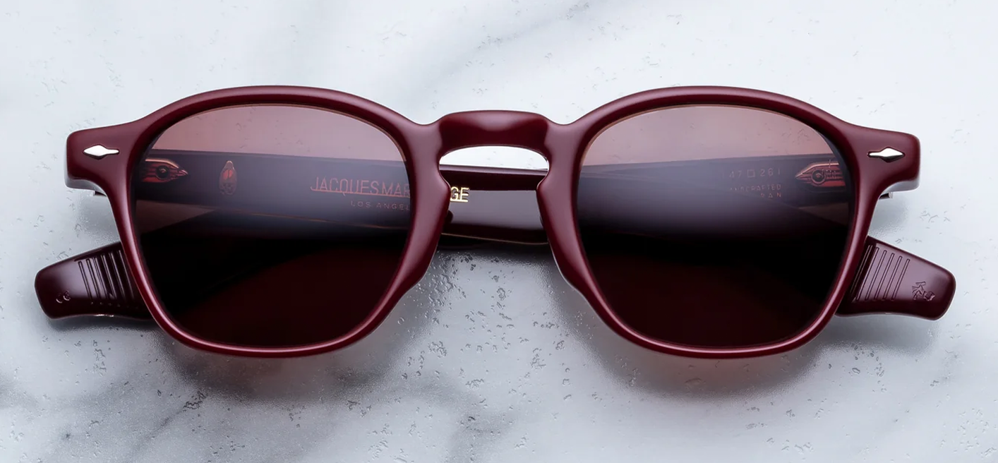  Front studio shot of Jacques Marie Mage Zephirin sunglasses in Bordeaux Empire, showcasing a vintage square shape in polished burgundy-red acetate with solid deep brown lenses and 18k dark gold arrowhead pins.