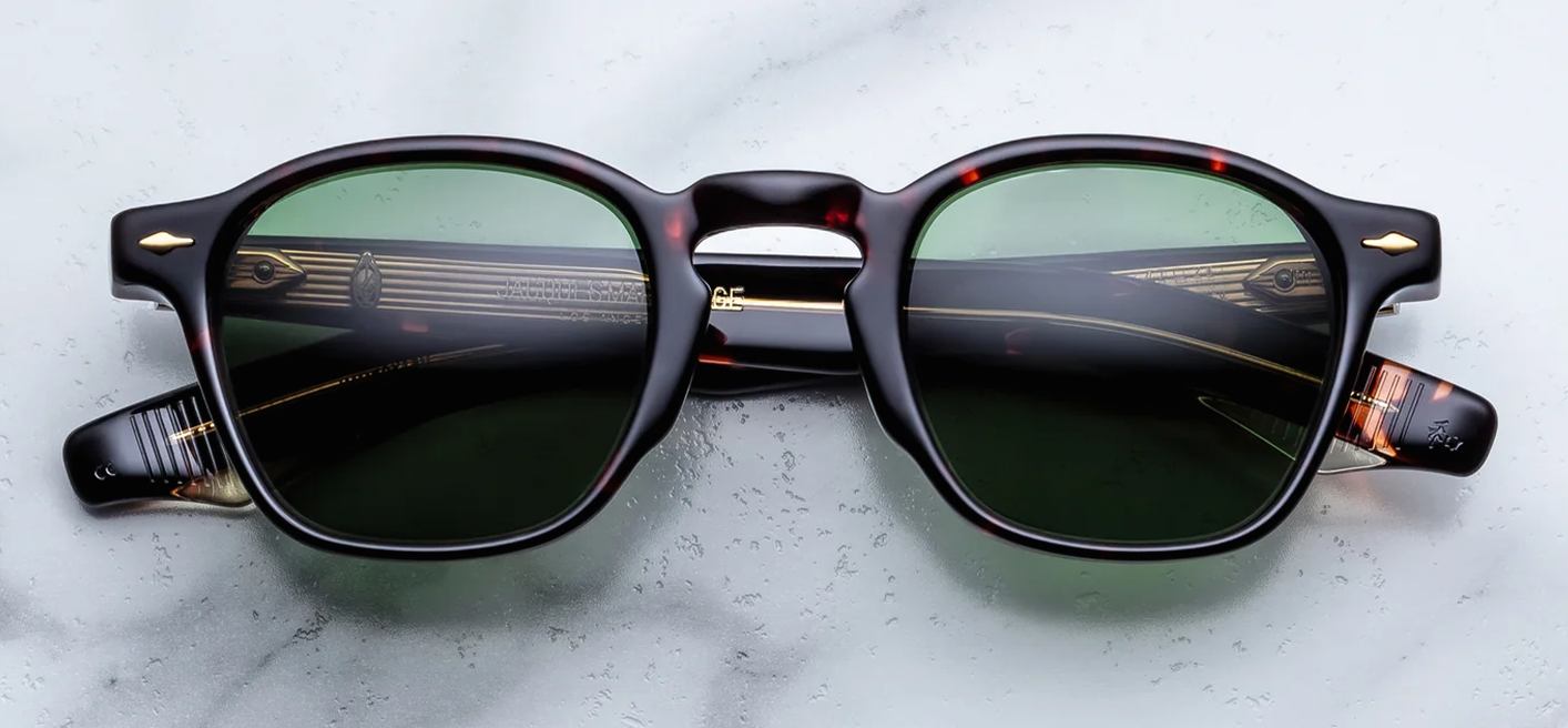 Front studio shot of Jacques Marie Mage Zephirin sunglasses in Etna, showing a rectangular 1940s-style frame in polished Havana tortoise shell acetate with dark green lenses and 18k dark gold arrowhead front pins.