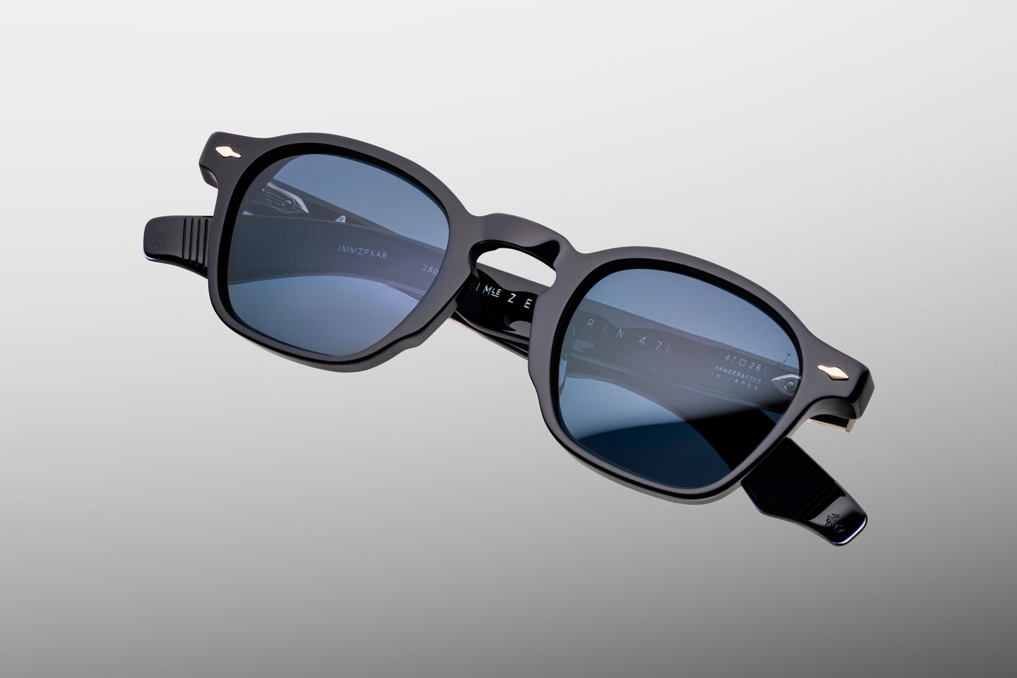 Close-up front view of Jacques Marie Mage Zephirin 47 Lacquer sunglasses featuring the signature Zephirin P3 lens shape, polished blue acetate and blue CR39 lenses