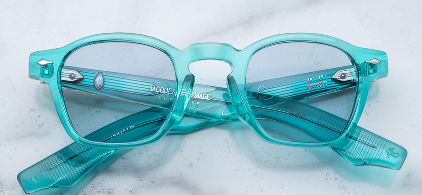 Back angle of Zephirin turquoise eyeglasses, emphasizing the interior acetate color, sculpted temples, and metal arrowhead accents.