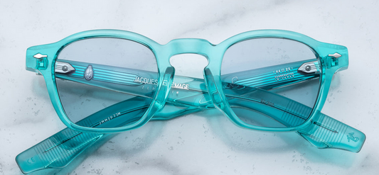 Back angle of Zephirin turquoise eyeglasses, emphasizing the interior acetate color, sculpted temples, and metal arrowhead accents.