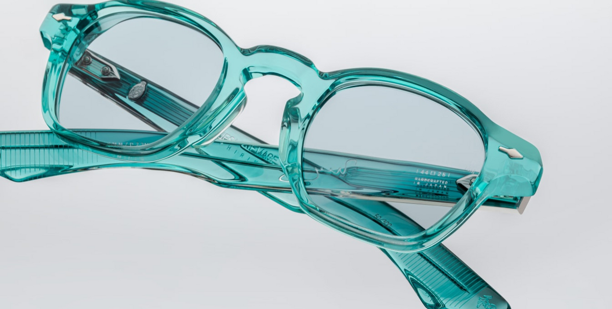 Close-up detail of Jacques Marie Mage Zephirin turquoise acetate frame with metal hardware accents