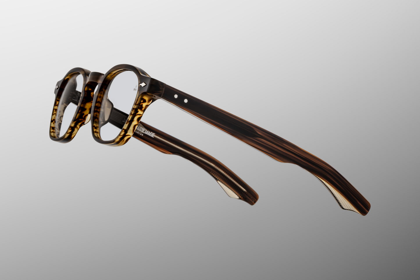 Side profile of Jacques Marie Mage Zephirin hazel superlight brown frames, highlighting sculpted acetate temples and sterling silver arrowhead detail.