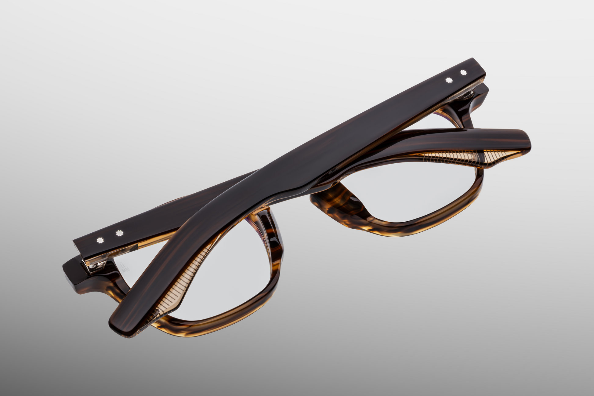 Rear view of hazel superlight brown Jacques Marie Mage Zephirin frames, highlighting the back of the temples and the inner side of the frame.