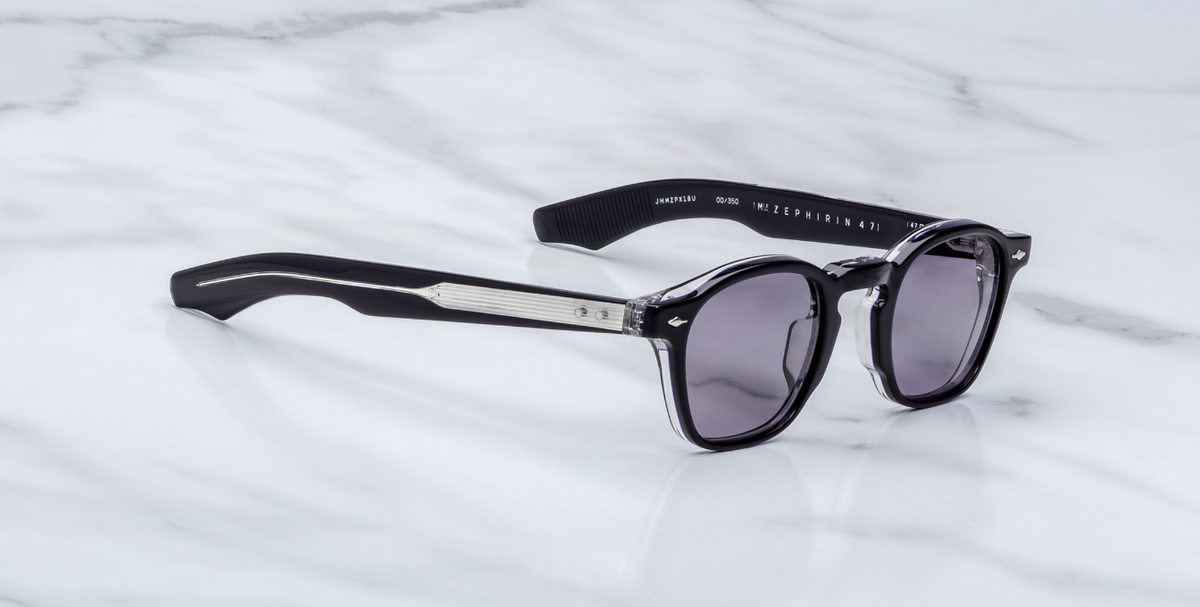 Side view of Zephirin Hudson: double‑laminated navy acetate temples, exposed silver wire‑core throughout, sterling silver arrowhead front pin and a custom 7‑barrel hinge with spur rivets