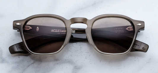Jacques Marie Mage Zephirin Lescot sunglasses front view, pre-WWII rectangular acetate frame with brass lenses and silver arrowhead pins
Front view of JMM Zephirin Lescot frame, slim rectangular silhouette with sculpted temples and luxury acetate finish