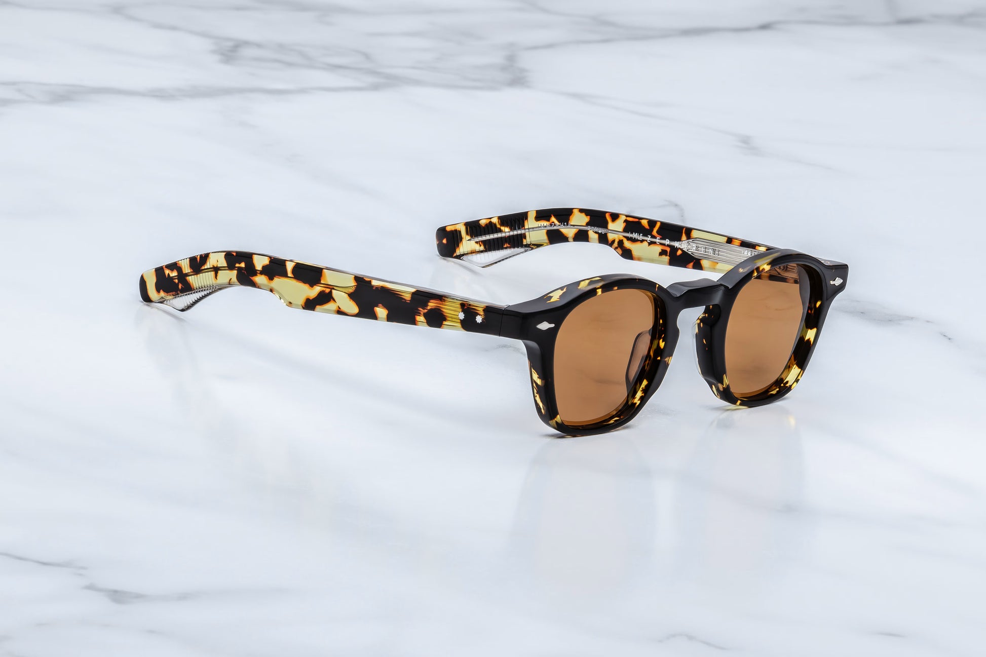 Jacques Marie Mage Zephirin Tokyo sunglasses side profile showcasing sculpted Havana acetate temples, sterling silver hardware and exposed wirecore detailing