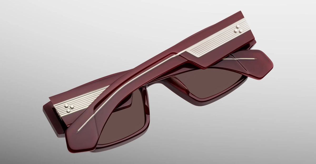 Rear view of JMM Zimmerman Bordeaux Empire glasses highlighting custom silver palladium spur-shaped rivets.