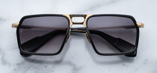 Jacques Marie Mage GT-R sunglasses, featuring a bold 12mm acetate lens-rim insert, dual-tone double-bridge detailing, and sculptural acetate temples. The lightweight titanium frame combines retro elegance with modern craftsmanship, embodying the performance-focused spirit of a classic roadster. Available at WINK Optometrists