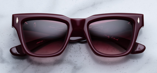 Front view of Jacques Marie Mage Torrance Reserve collector sunglasses in polished red acetate with bold rectangular silhouette, sterling silver arrowhead front pins and luxury limited edition design — available at WINK Optometrists Australia