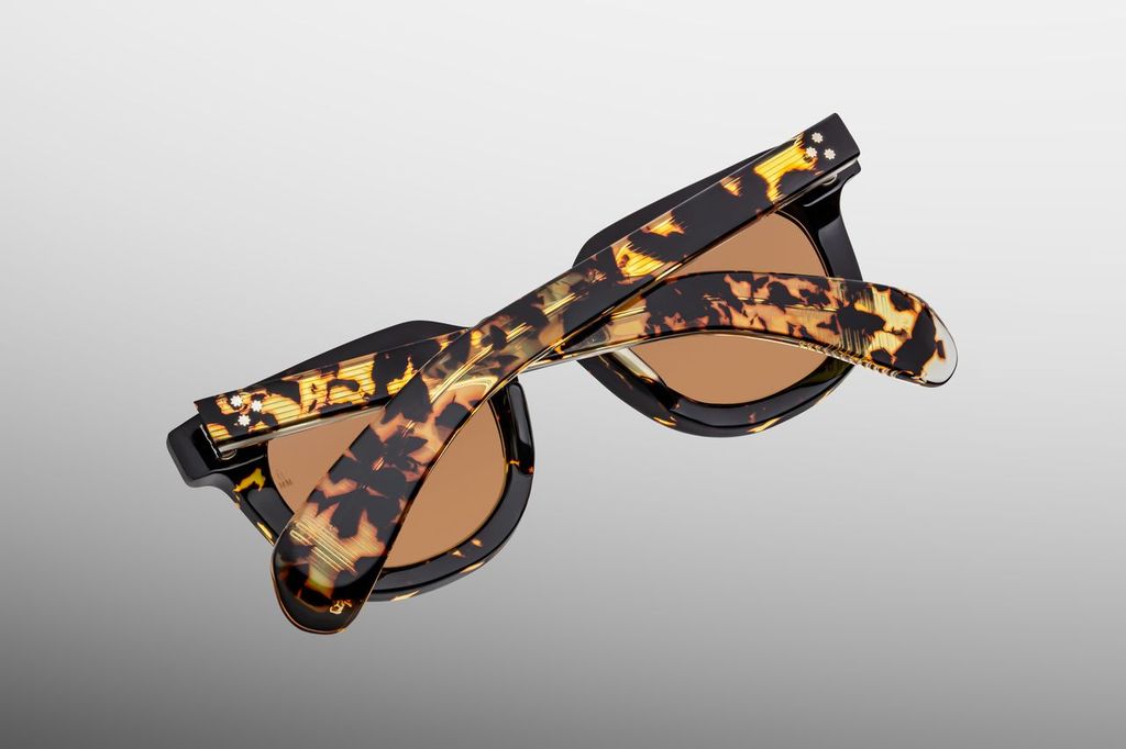 Rear detail of JMM Vendome Tokyo sunglasses showing the custom tension-secured 7-barrel hinge craftsmanship at Wink Optometrists.