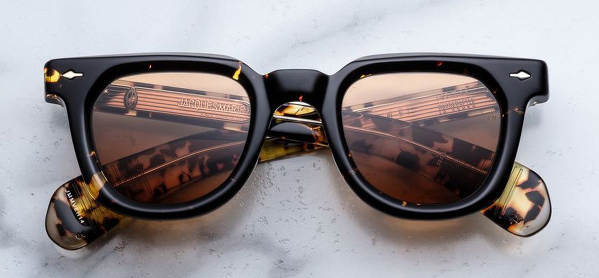 Front view of limited-edition Jacques Marie Mage Vendome Tokyo tortoiseshell sunglasses with orange lenses at Wink Optometrists.