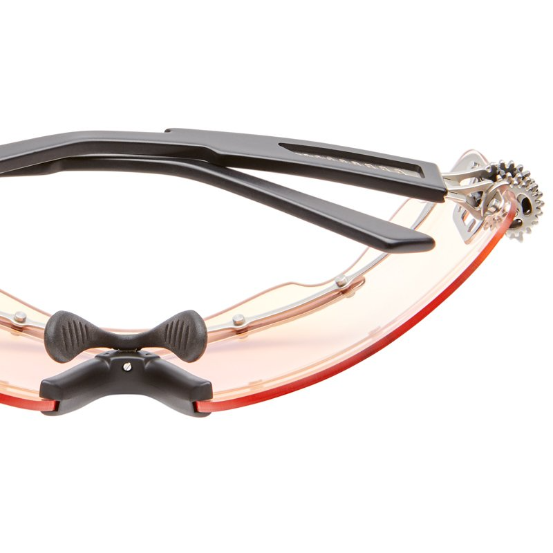 Detail shot from beneath of Kuboraum E16 SI Silver sunglasses showing the nosepad, bridge and lens edge from the eyewear’s underside