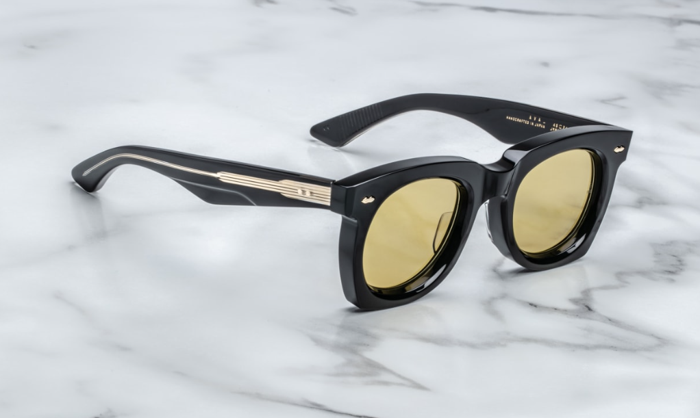 Sleek '50s inspired glasses with graceful lines, signature double-arrowhead front pins, and custom double-laminated temples with refined 'Lever' wire core. Limited edition of 500 pieces. Handcrafted in Japan. Size 45/24. 