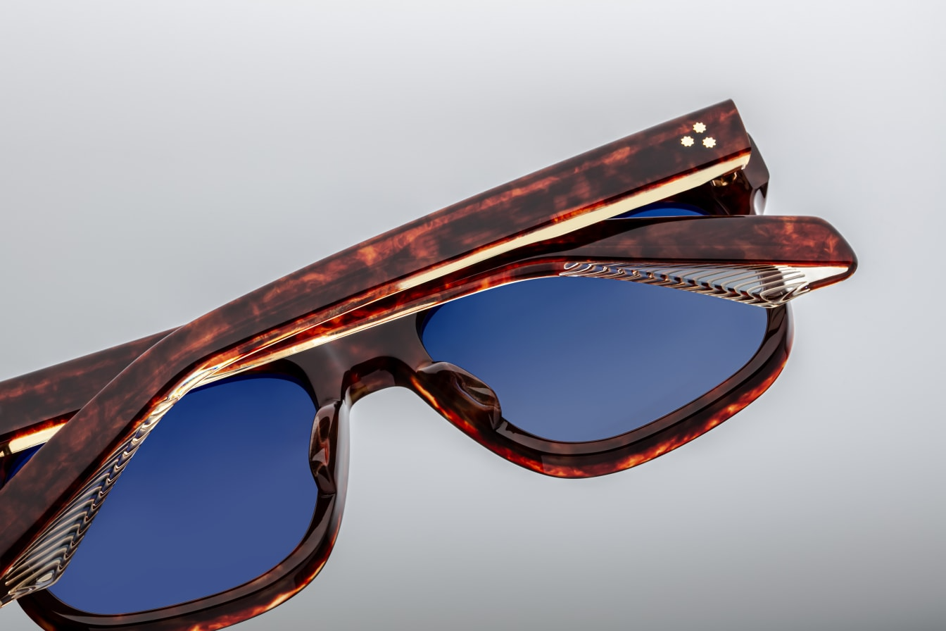 Inspired by Yves Saint Laurent, a French fashion designer. These are classic rectangular glasses with soft angles and notable volumes. 10mm block, polished brown acetate frame, Denim Gradient CR39. Handcrafted in Japan. Limited production of 250. Size 56/19. 