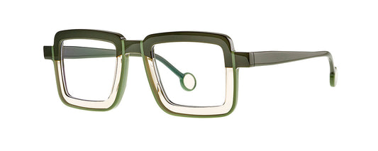 Theo Hinta eyewear in Musk & Olive color, featuring a unique geometric frame design with a combination of muted green and brown hues, displayed on a neutral background.