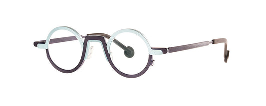 Theo Myeong Dong Blue eyewear featuring a unique geometric design with a vibrant blue frame, showcasing a modern and stylish look.
