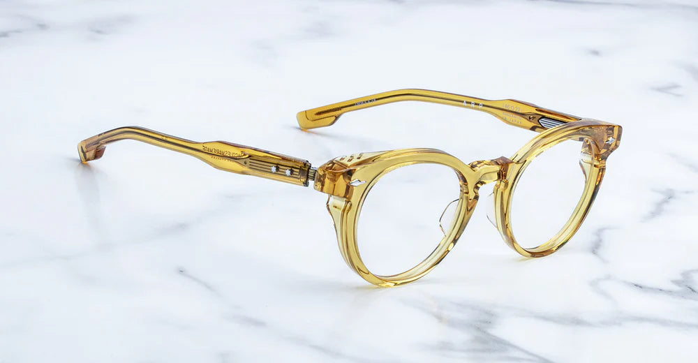 2MM BLOCK YELLOW W/ CLEAR BEIGE CUSTOM FLOATING HINGE SYSTEM.
HARDWARE: STERLING SILVER.
Limited edition of 75 pieces.
Handcrafted in Japan. Size 46/22
